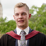 image of Sam at graduation